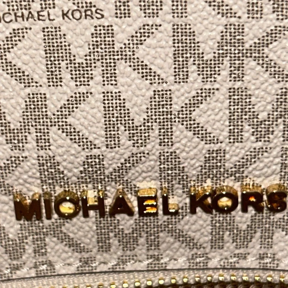 Michael Kors coa plus